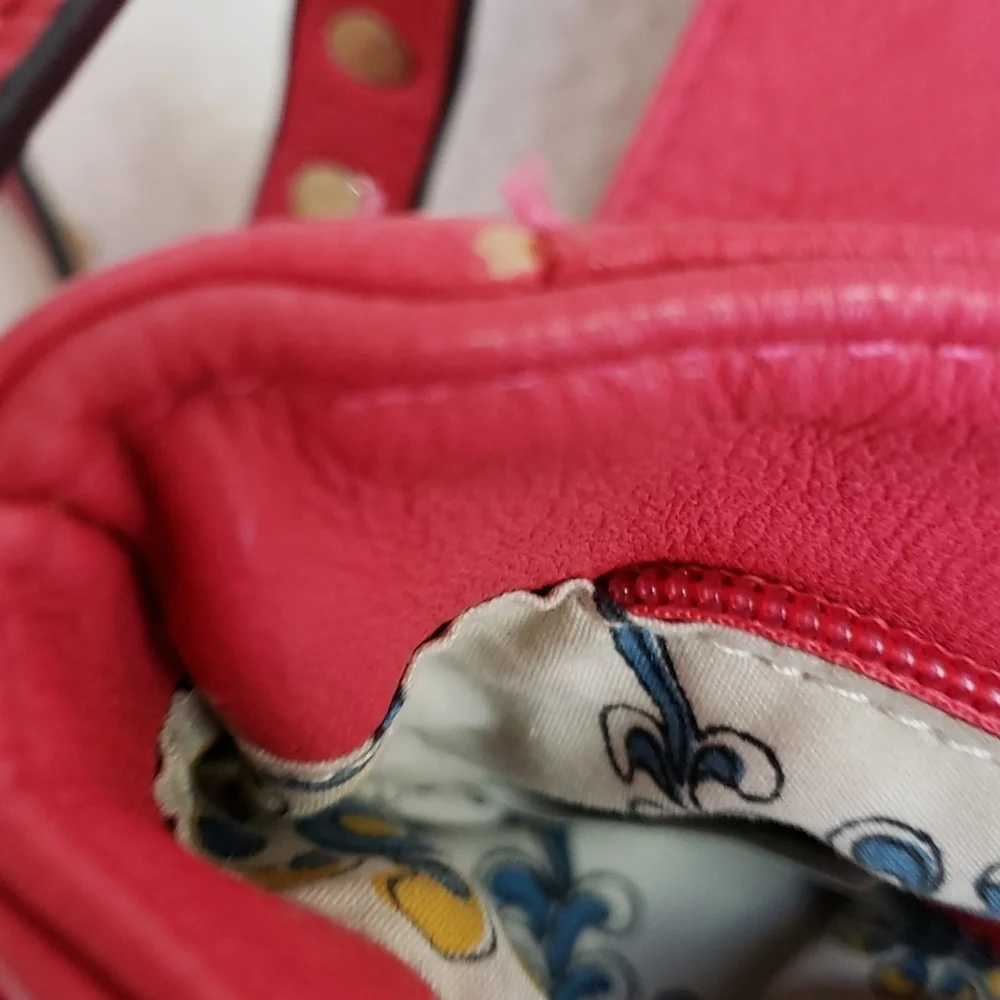 RED studded-embellished lipstick red vegan leather shoulder bag